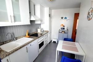 Cucina o angolo cottura di Sunny Apartment
