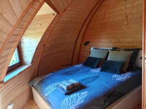 Posteľ alebo postele v izbe v ubytovaní Grzybek Maison champignon