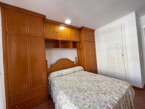 Postel nebo postele na pokoji v ubytování TERRASOL PIRAMIDES 1 DORMITORIO CALETA DE VELEZ