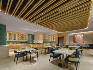 Εστιατόριο ή άλλο μέρος για φαγητό στο Hilton Garden Inn Aksu Downtown