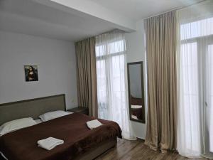 Letto o letti in una camera di IVERIA BEACH
