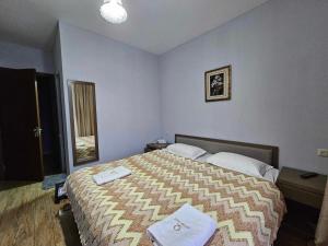 Letto o letti in una camera di IVERIA BEACH
