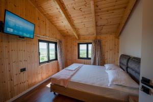 Postel nebo postele na pokoji v ubytování Shena The Farm Boutique