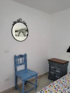 A bed or beds in a room at Appartamenti Vanacore