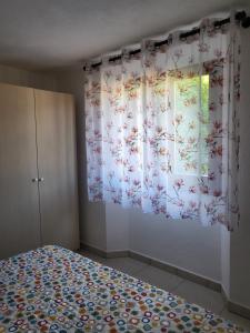 A bed or beds in a room at Appartamenti Vanacore