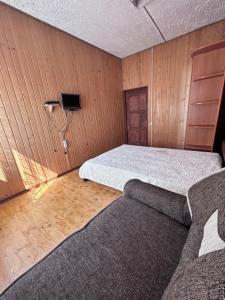 Postel nebo postele na pokoji v ubytování Velyka Gora