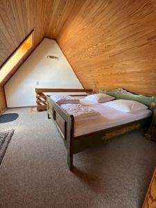 Ένα ή περισσότερα κρεβάτια σε δωμάτιο στο Kampweg 1 Wohnung 2 +7 φωτογραφίες