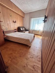 Postel nebo postele na pokoji v ubytování Velyka Gora