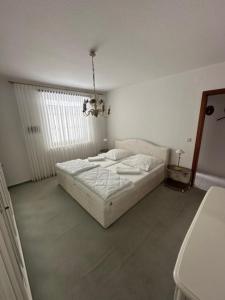 Ένα ή περισσότερα κρεβάτια σε δωμάτιο στο Kampweg 1 Wohnung Nr 3 +4 φωτογραφίες