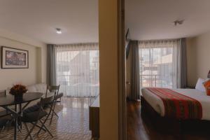 Llit o llits en una habitació de Quechua ApartHotel