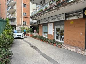 a car parked in front of a building at Sweet Home Capodimonte in Naples