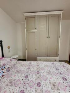 A bed or beds in a room at Appartamenti Vanacore