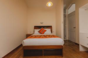 Llit o llits en una habitació de Quechua ApartHotel