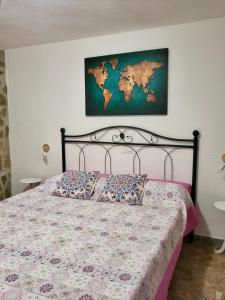 A bed or beds in a room at Appartamenti Vanacore