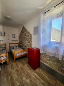 A bed or beds in a room at Appartamenti Vanacore