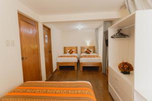 Llit o llits en una habitació de Quechua ApartHotel