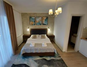Postel nebo postele na pokoji v ubytování Apartments Marina