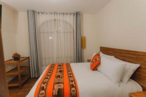 Llit o llits en una habitació de Quechua ApartHotel