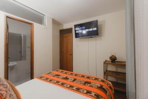 Llit o llits en una habitació de Quechua ApartHotel