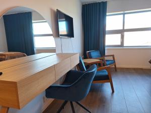 TV a/nebo společenská místnost v ubytování Tjeldsundbrua Hotel