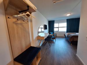 Postel nebo postele na pokoji v ubytování Tjeldsundbrua Hotel