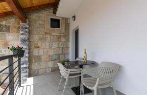 Televízia a/alebo spoločenská miestnosť v ubytovaní Apartments Villa Nadalina Deluxe