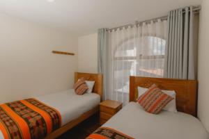 Llit o llits en una habitació de Quechua ApartHotel