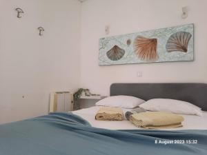 BLife Maresiya private apartment tesisinde bir odada yatak veya yataklar