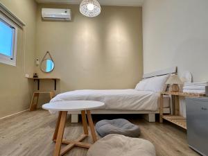 山有巷宅 Alley House客房内的一张或多张床位