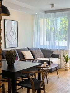 Posedenie v ubytovaní Przytulny apartament 5 minut od morza