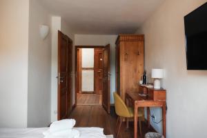 Ein Bett oder Betten in einem Zimmer der Unterkunft Mühle Tornow am Wentowsee