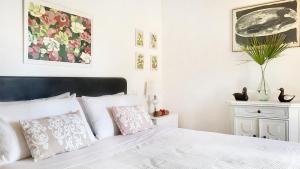 A bed or beds in a room at Agriturismo Podere Le Palaie