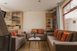 Zona d'estar a Quechua ApartHotel