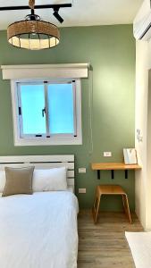 山有巷宅 Alley House客房内的一张或多张床位