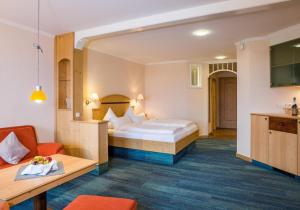Postel nebo postele na pokoji v ubytování Panoramahotel Grobauer