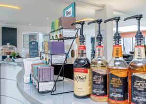 a group of bottles of wine sitting on a counter at Crofthead in Ayr +39 photos