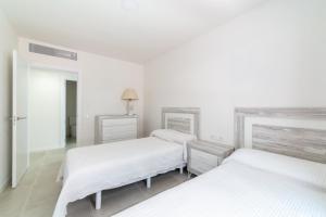 Postel nebo postele na pokoji v ubytování Calafell Seaside Escape