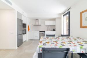 Kuchyň nebo kuchyňský kout v ubytování Calafell Seaside Escape