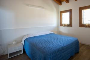 Postel nebo postele na pokoji v ubytování Casa Oliver