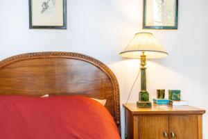 Säng eller sängar i ett rum på GuestReady - A picturesque stay in Paris