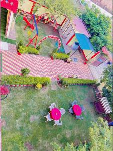 an aerial view of a park with a playground at Bundeli Farm Resort & Banquet Orchha in Orchha