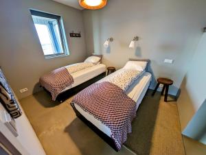 Hótel Hrífunes by Ourhotels客房内的一张或多张床位