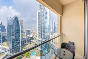 a balcony with a view of a city at Emaar Residences Fashion Avenue, formerly Address Dubai Mall in Dubai
