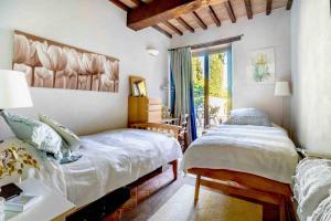Tempat tidur dalam kamar di Villa Sosta