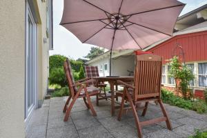 Ein Patio oder anderer Außenbereich in der Unterkunft Haus Neuhof 01