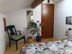 Postel nebo postele na pokoji v ubytování B&B Monte Adone