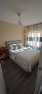 Postel nebo postele na pokoji v ubytování Apartamento cerca del Pilar