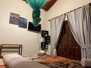Letto o letti in una camera di Cozy Heaven