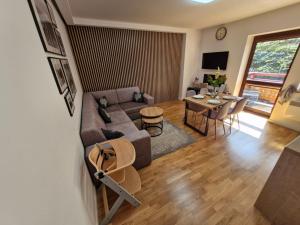 Posedenie v ubytovaní Apartament Pod Brzyzkiem & Spa
