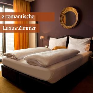 Letto o letti in una camera di Hotel Lava Inn - 24 h Check-In - Nähe LKH, Landeskrankenhaus, Feldbach
